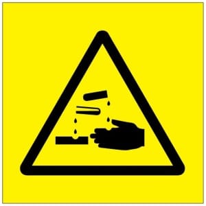 Syövyttävää symboli kyltti